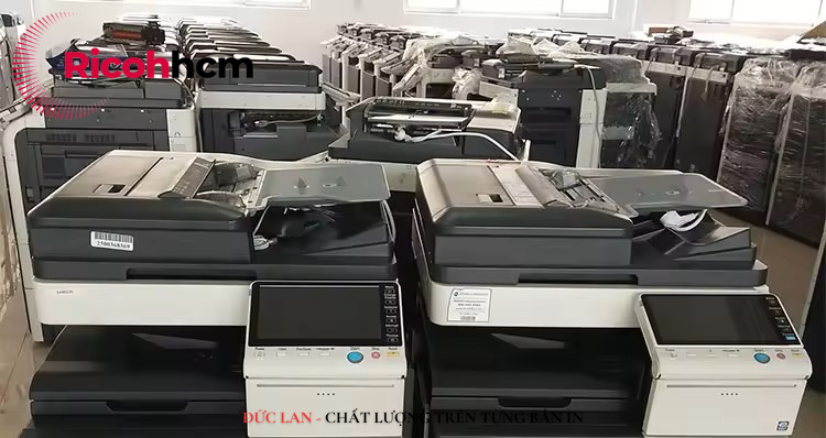 Chọn máy photocopy màu Ricoh hay Canon?